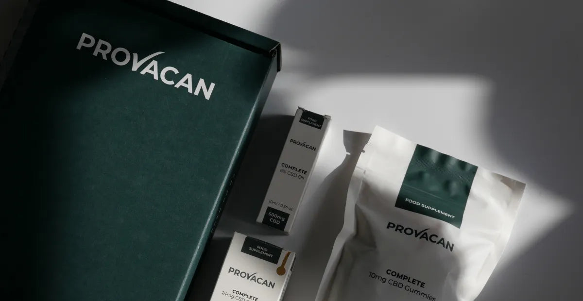 Provacan CBD products (oil and gummies) next to a dark green subscription box on a white background