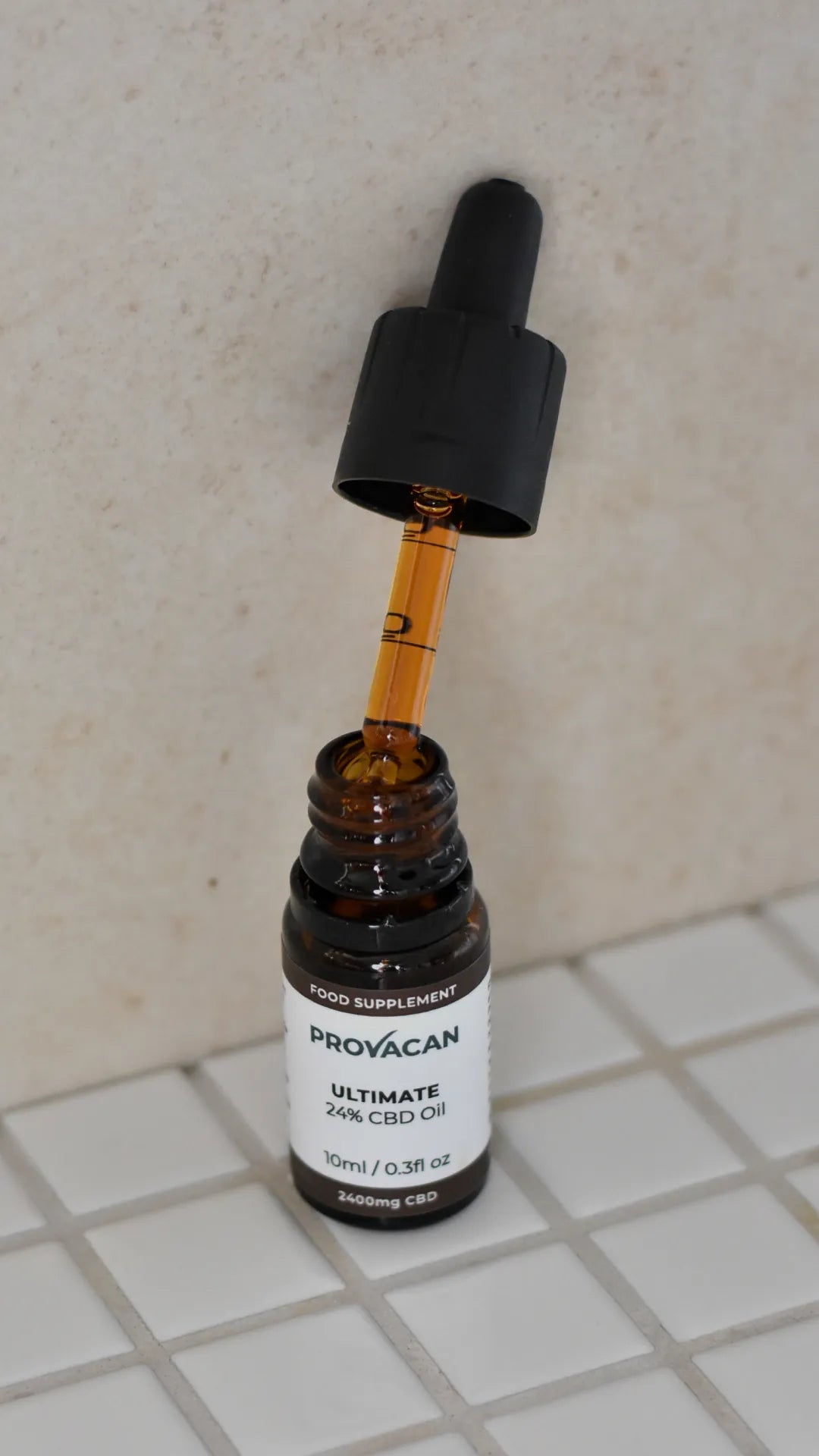 Opened bottle of Ultimate 2400mg CBD oil from Provacan