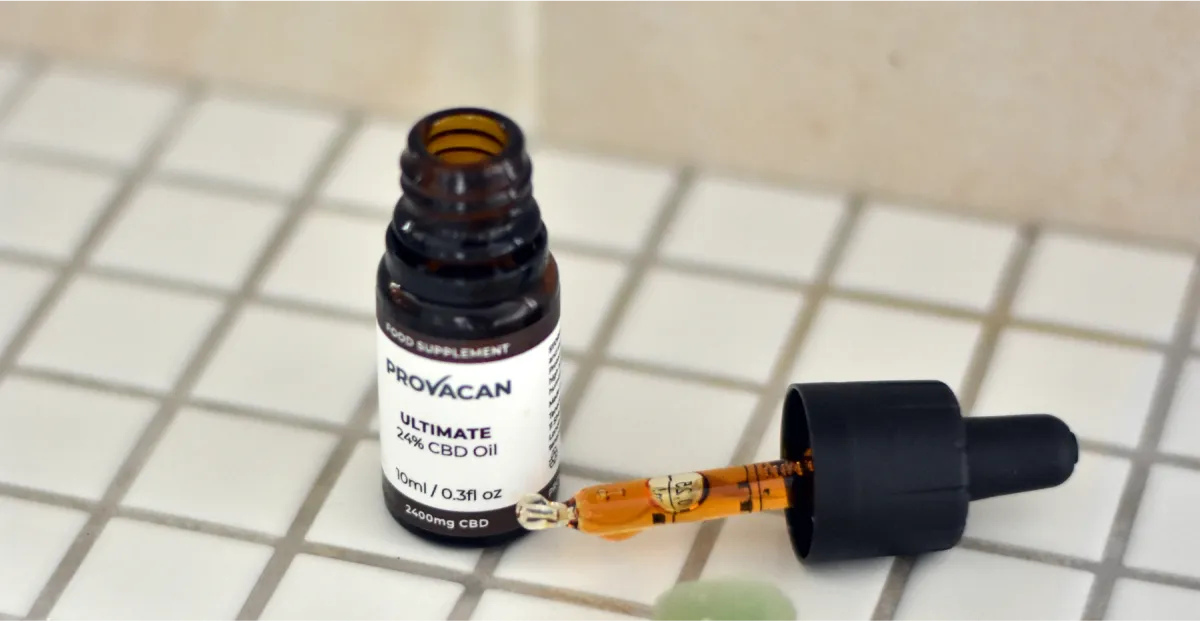 Provacan Ultimate 24% 2400mg CBD oil dropper bottle on a tiled surface