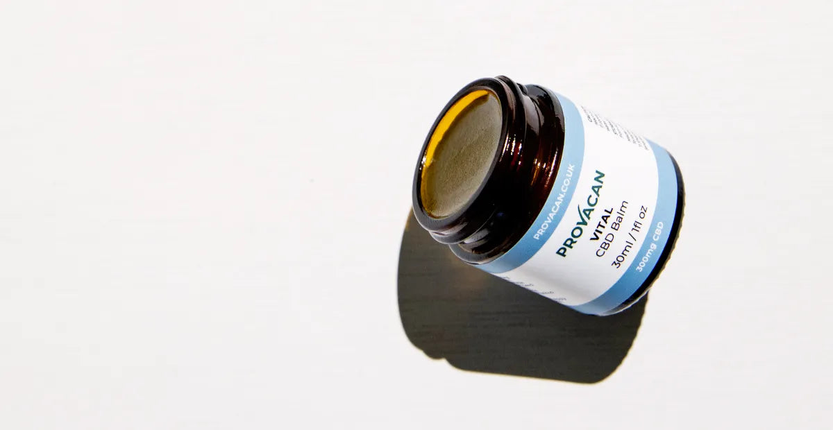 Provacan Natural Stress Relief: open jar of Vital 300mg CBD Balm on white background