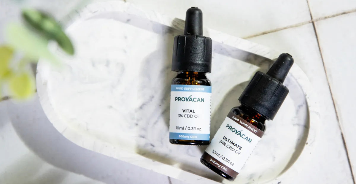 Provacan Natural Stress Relief: Vital 3% 300mg CBD Oil and Ultimate 24% 2400mg CBD oil on a marble tray