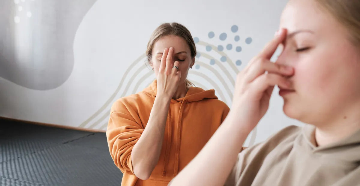 Provacan Natural Stress Relief: Two women doing breathing exercises