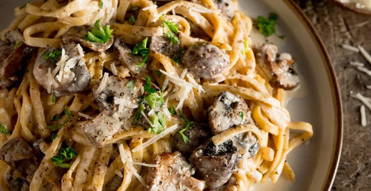 Vegan creamy mushrooms and leek pasta on a plate