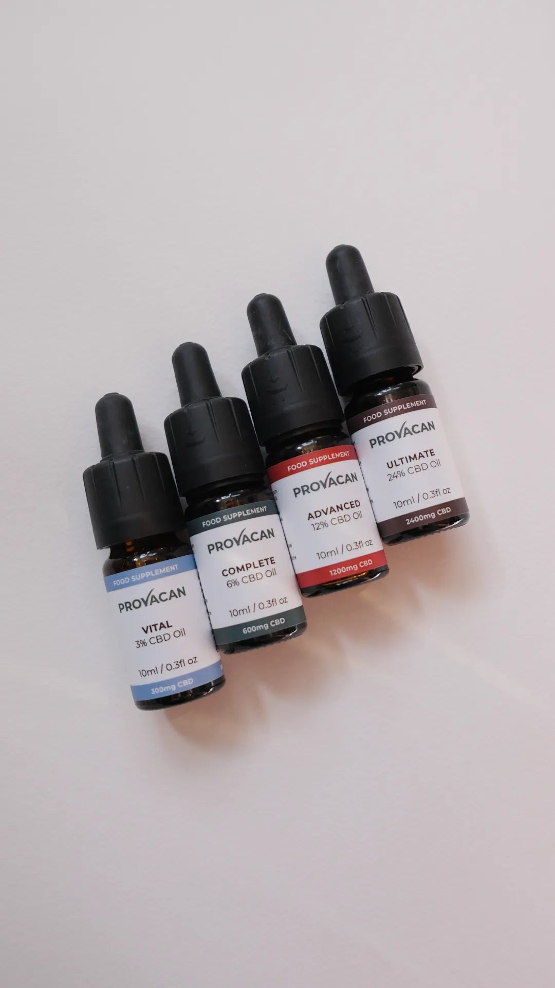 CBD oil from Provacan: Vital 300mg CBD oil, Complete 600mg CBD oil, Advanced 1200mg CBD oil, Ultimate 2400mg CBD oil laid on a white background