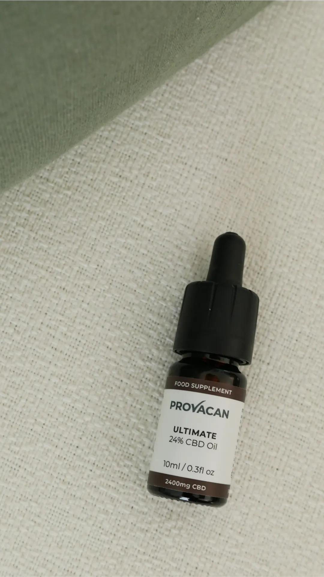 Bottle of Provacan premium CBD Ultimate oil 24% on a light background