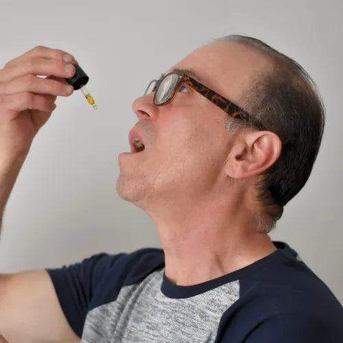 Man taking Provacan CBD oil