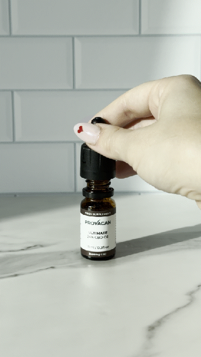 GIF of the Provacan Ultimate 2400mg / 24% CBD Oil being held by someone and showing the dropper